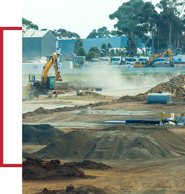 A picture of an industrial area with lots of dirt.